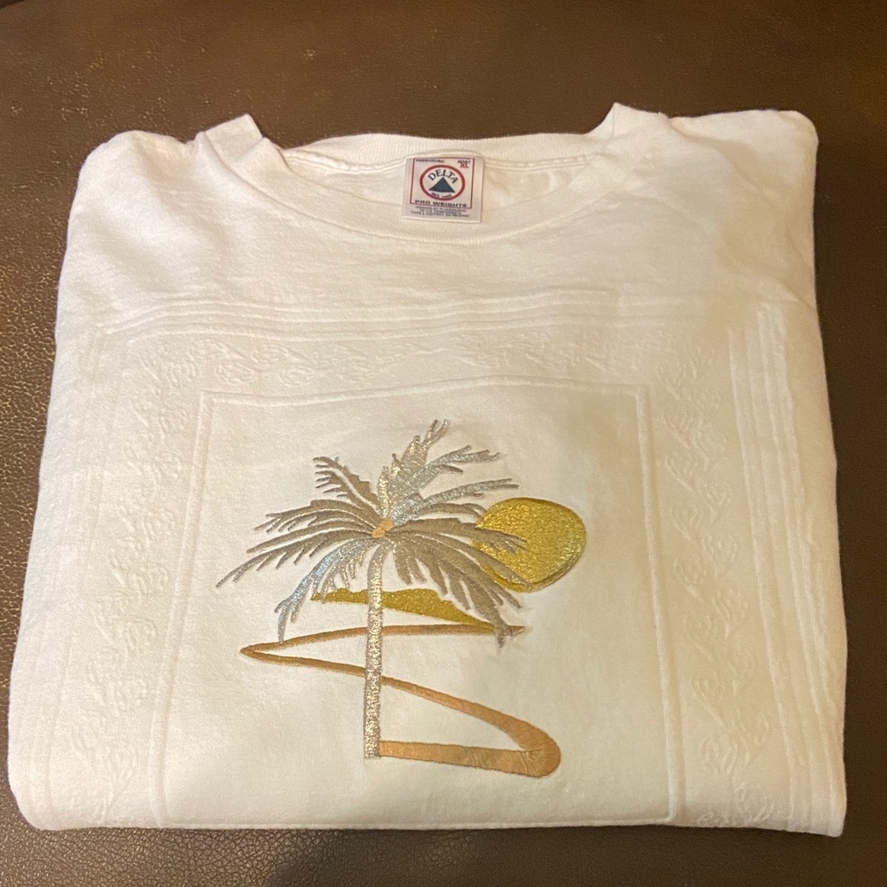 Delta White T-Shirt with Palm Tree Design